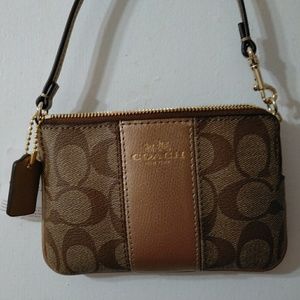 Coach small zip bag